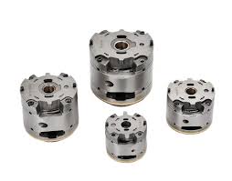 Technician inspecting vane pump